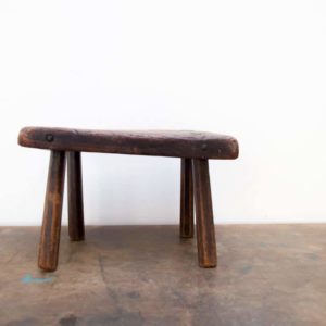 antique milking stool