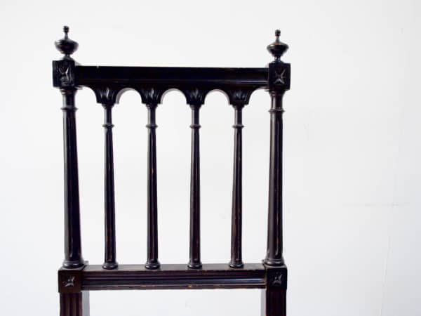 A pair of Asethetic movement, ebonised chairs