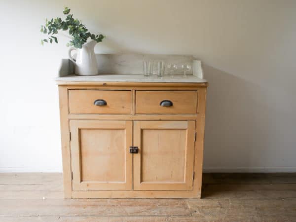 Pine cupboard with marble top
