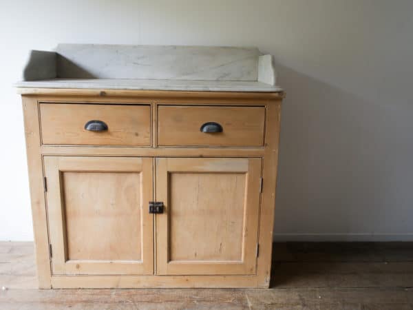 Pine cupboard with marble top