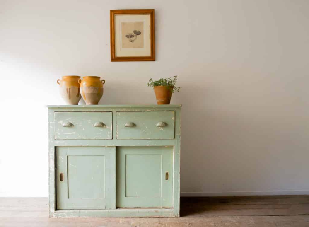 Sage green cupboard The Vintage Rooms