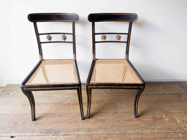 A pair of Regency style chairs