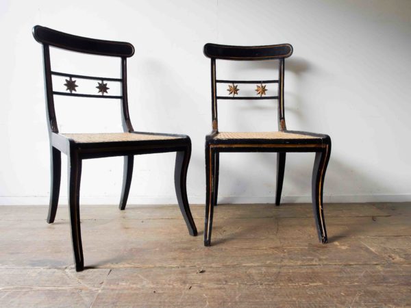 A pair of Regency style chairs